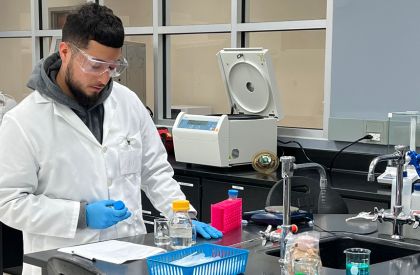 Photo of Male Student in the Science Lab