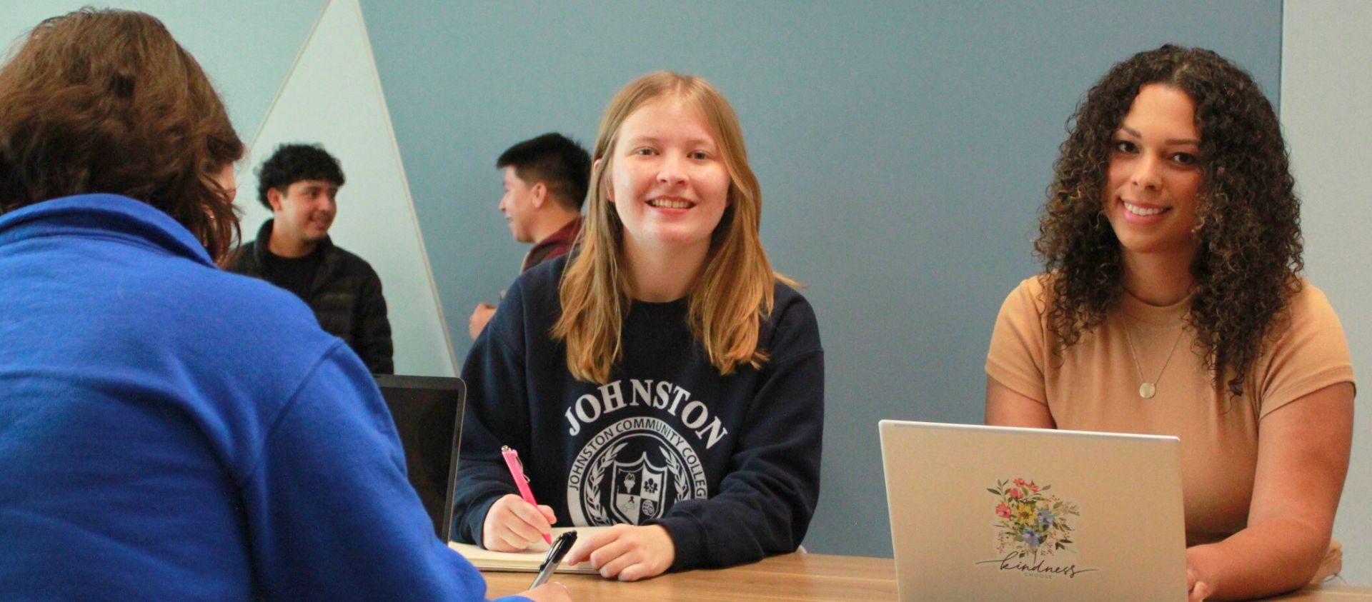 JCC Students Studing in the Wood Building Smiling
