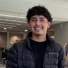 Picture of student smiling corresponding with quote