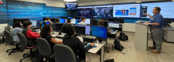 Student working in the Cybersecurity Denfense HQ