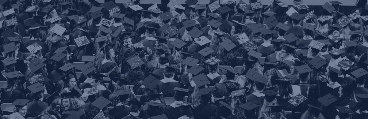 Johnston Community College Graduation, Many graduation caps with blue tinting for website footer