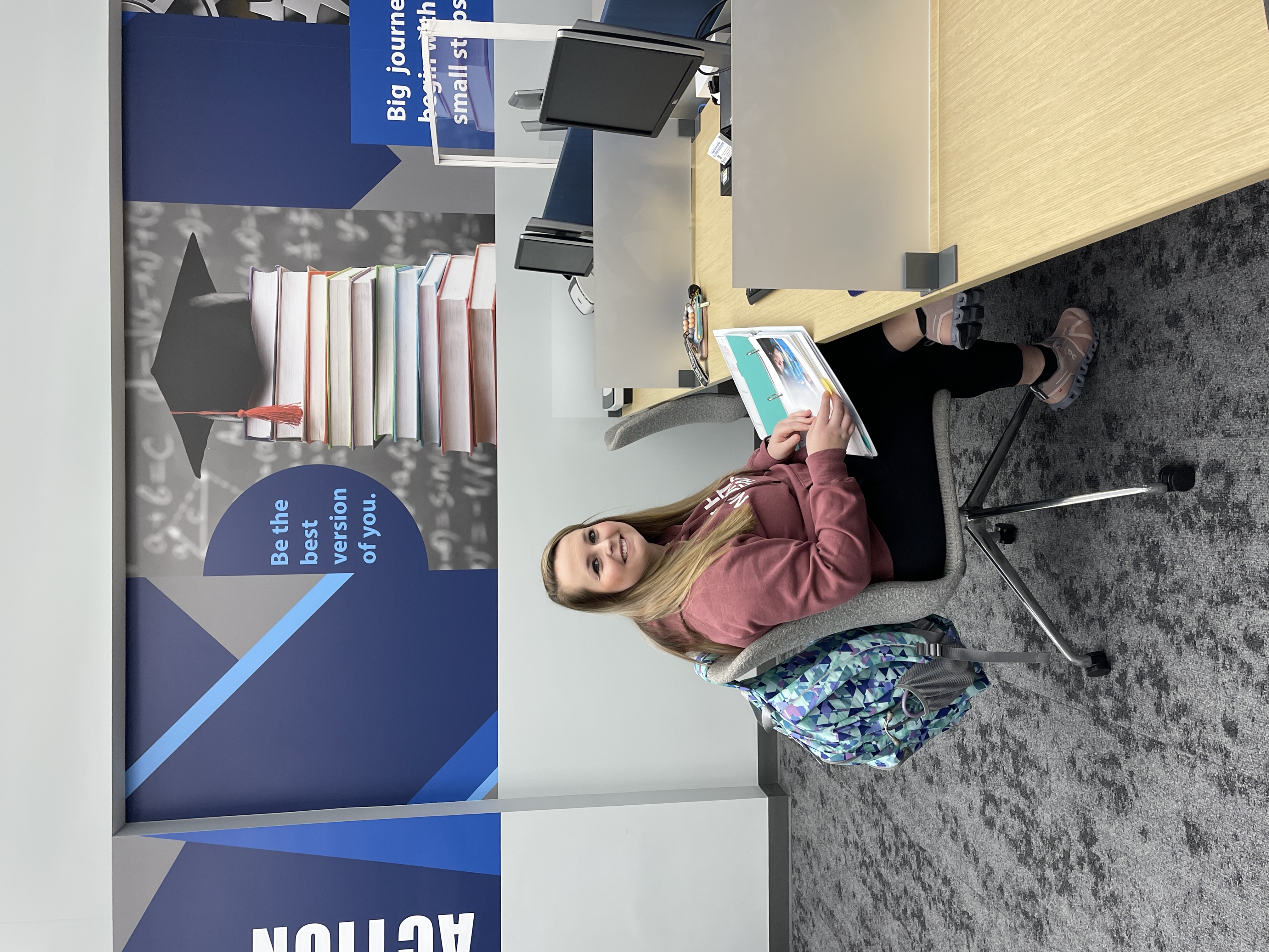 Female student sitting at desk in Student Success Center