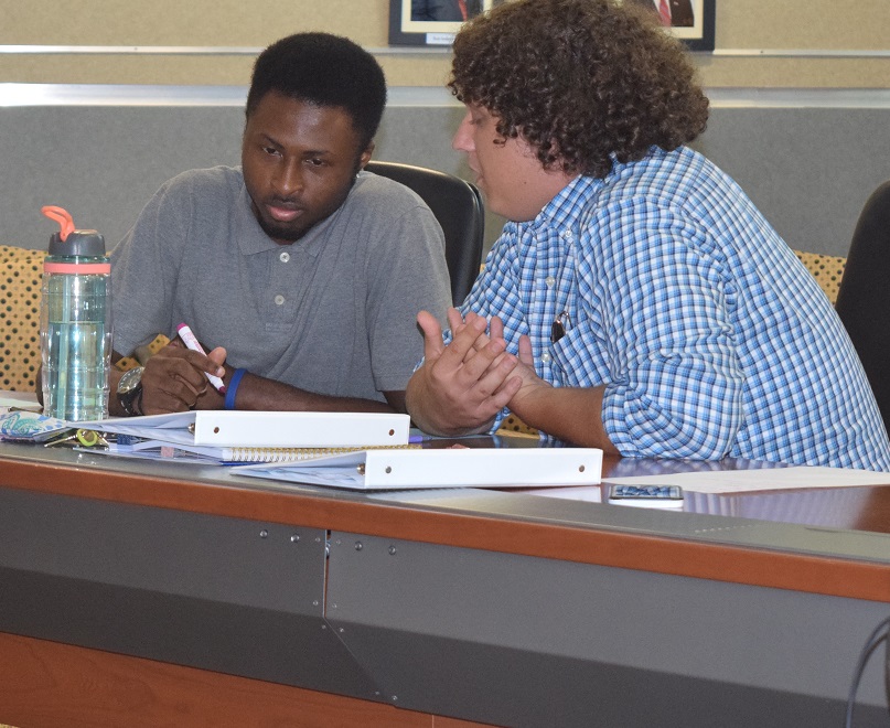 two students working together